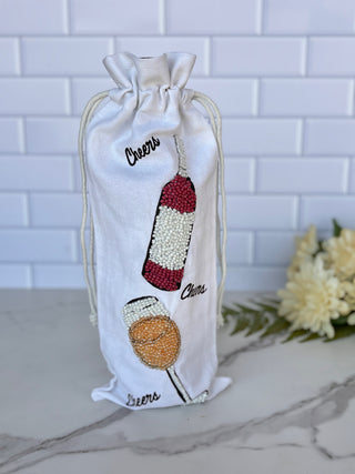 white beaded wine bag with wine bottle
