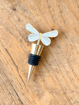 a charming gold and white butterfly bottle stopper