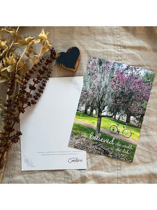 sweet inspirational card for a loved one with blooming trees on the front