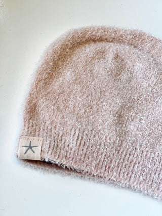soft barefoot dream baby beanie in light pink color
