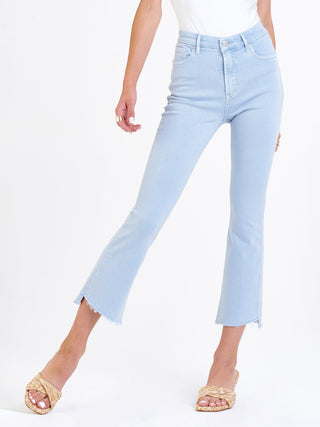 fitted high rise cropped flare jeans in a sky blue color