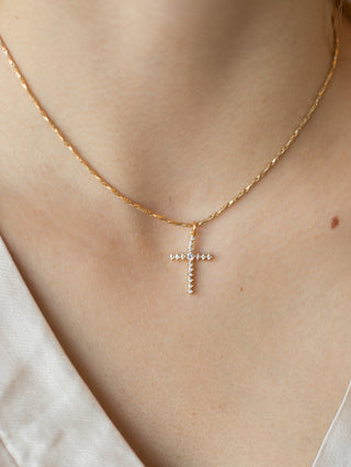 wear this dainty diamond cross neckalce on a gold chain as everyday spiritual christian jewelry or give as a gift