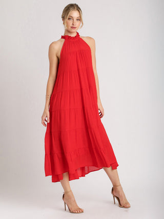 flirty cherry red maxi dress with a halter neck and charming bow tie detail in the back