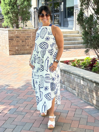 breezy white maxi dress with a fun fruity print in navy blue and back tie