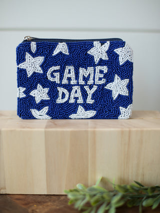 a university of kentucky game day coin bag made of blue and white beading with a star pattern and reads game day