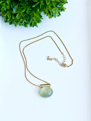 crafted green pebble charm necklace on a gold chain with lobster clasp