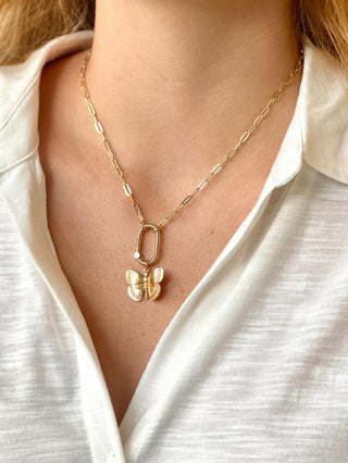 charming gold link chain necklace with a dangling gold butterfly charm