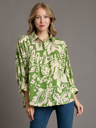 relaxed fit collared blouse in a green floral print pattern