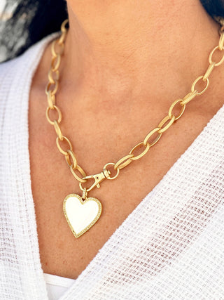 date night love necklace with gold chain and white enamel heart pendant