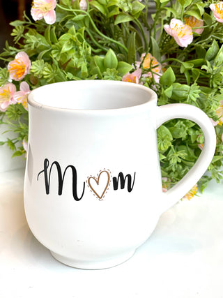 a white ceramic coffee lover mug that reads mom for a mothers day gift
