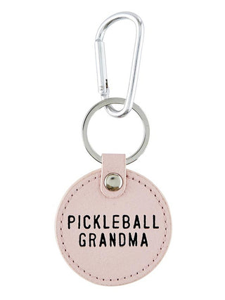 round pickleball pink keychain with silver hardware