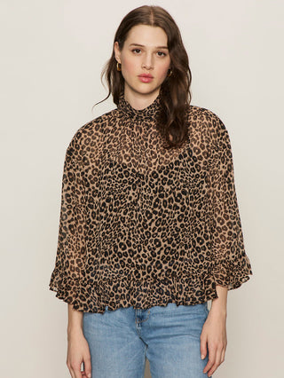 a sheer crinkled cheetah print blouse with ruffled three quarter sleeves and a high neck