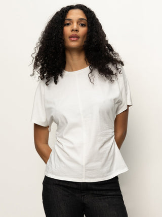 white short dolman sleeve top with shirring at waist