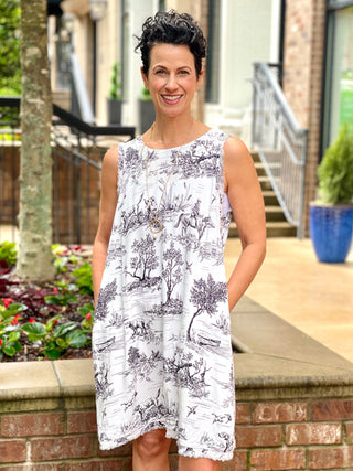 relaxed fit sleeveless white and black toile dress with unique landscape print and breezy pockets