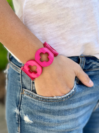 bright pink chunky quatrefoil pattern resign bracelets with stretchy design perfect for spring