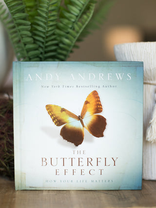 a self help coffee table book titled the butterfly effect