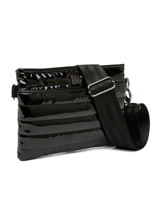 wear this covertible patent bag in black with two black straps for edgy daily wear and accessorizing