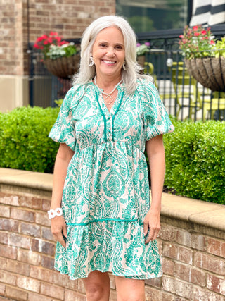 teal green mini dress with balloon sleeves a fun paisley print and velvet tape detail