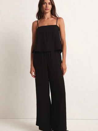 a black spaghetti top with square neckline and relaxed fit shown with matching pants