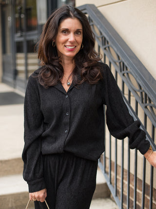 wear this crinkle button up top in black with a relaxed classic fit as cozy loungewear or on holiday weekends