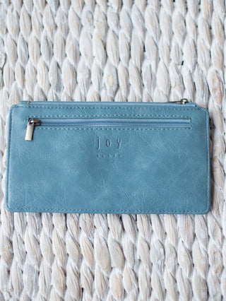 sky blue vegan leather wallet with cardholder exterior card pockets and zipper closure back