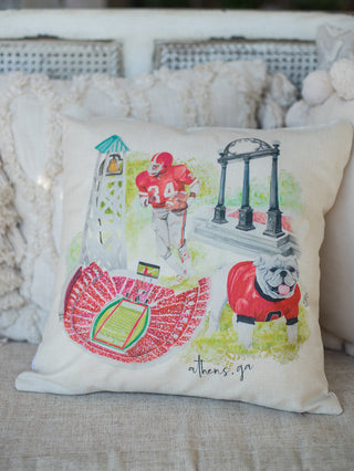 an off white pillow featuring a premium watercolor collage showing university of georgia highlights