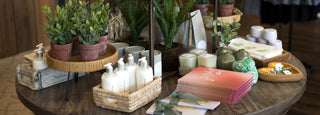 books candles and other gifts on display table
