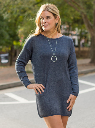 a long sleeve navy blue dress in cozy sweater fabric with a crew neckline great for cool weather dressing
