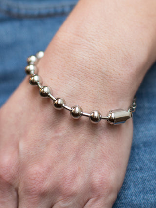 a silver ball chain bracelet