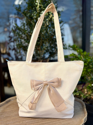 cream tote bag with sheer shimmery bow 