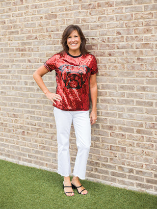 a red and black sequin uga shirt with a bulldog across the chest perfect of dawgs football games shown with white pants