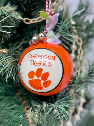 an orange and white clemson tigers christmas ornament