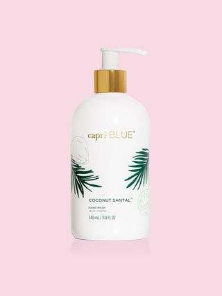 a sleek white bottle of capri blue coconut santal hand wash