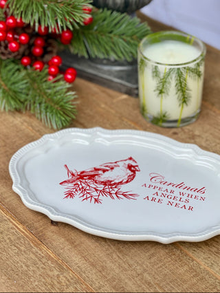 a white stoneware sentiment tray with a red cardinal that says cardinals appear when angels are near