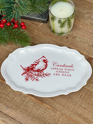 a white stoneware sentiment tray with a red cardinal that says cardinals appear when angels are near