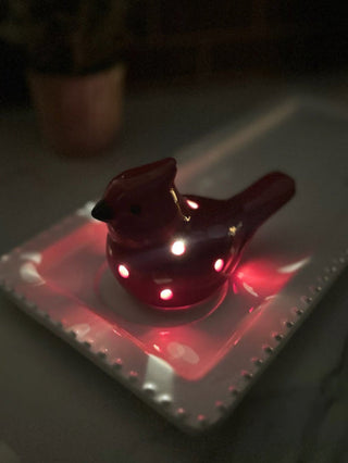 a red cardinal holiday sitter that lights up