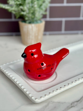 a red cardinal light up sitter for the holidays