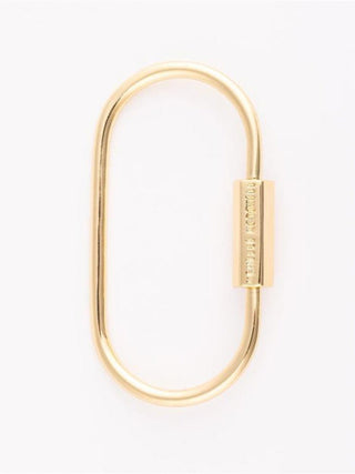 a gold charm carabiner to hold charms