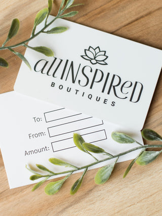 a white all inspired gift card with logo and text in black and space to write to from and amount