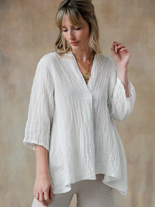 flattering white cobblestone linen top with three quarter sleeves and relaxed fit