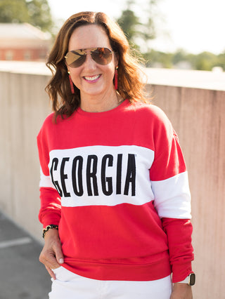 a uga bulldogs sweatshirt with red and white color block perfect for fall football games and georgia dawgs pride