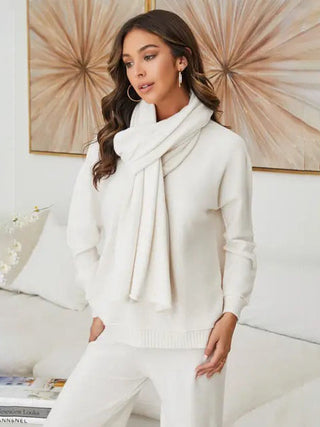 a soft ivory thread knit scarf