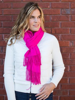 wear this hot pink scarf with fringe as a cozy winter accessory or gift as a christmas present stocking stuffer