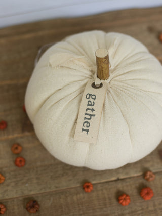 an off white cotton pumpkins with a sentiment tag that reads gather perfect for fall decor over halloween and thanksgiving