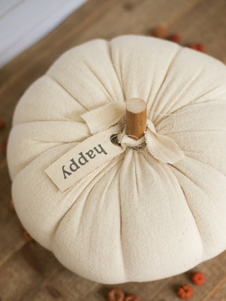 an off white cotton pumpkins with a sentiment tag that reads happy perfect for fall decor over halloween and thanksgiving