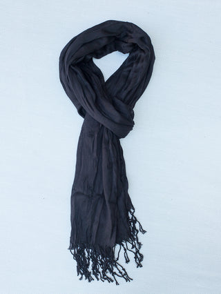 this black crinkle scarf is lightweight and features a fringe hem