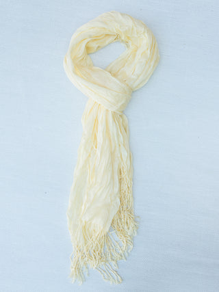 this off white crinkle scarf is lightweight and features a fringe hem