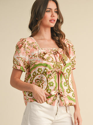 pink and green medallion print bow tie front top with square neckline and puff short sleeves