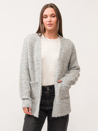light grey ultra soft fuzzy long sleeve cardigan with two front pockets 