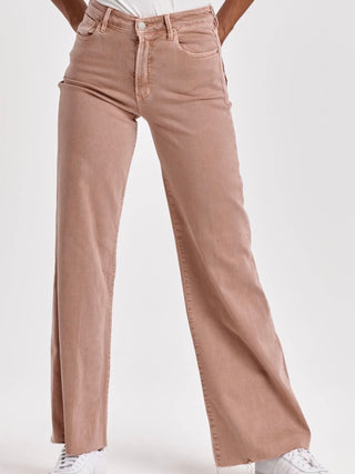 a pair of mid rise blush pink wide leg pants